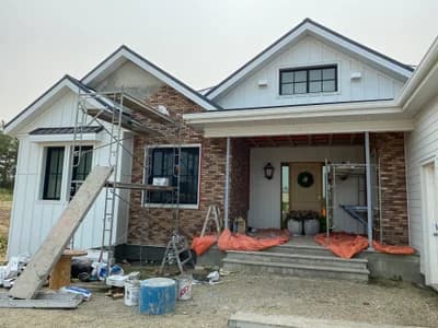 Brick residential exterior with scaffolding